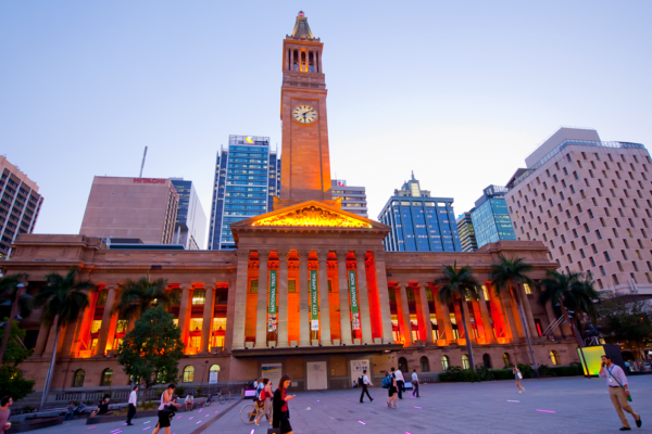 Drive past Brisbane City Hall in your car rental